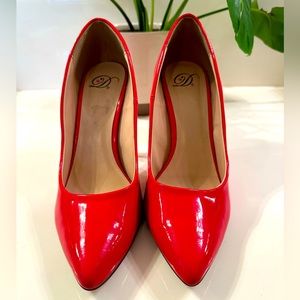 Delicious red patent high heel pumps. Size 10
